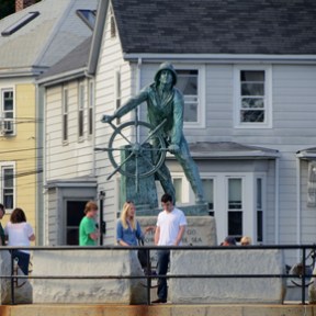 a man riding a skateboard up the side of a building
