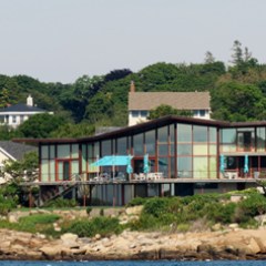 a small house in a body of water