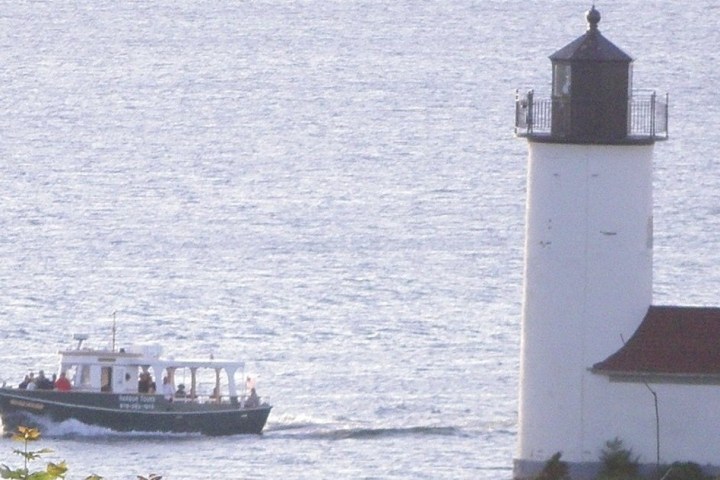 a small boat in a large body of water